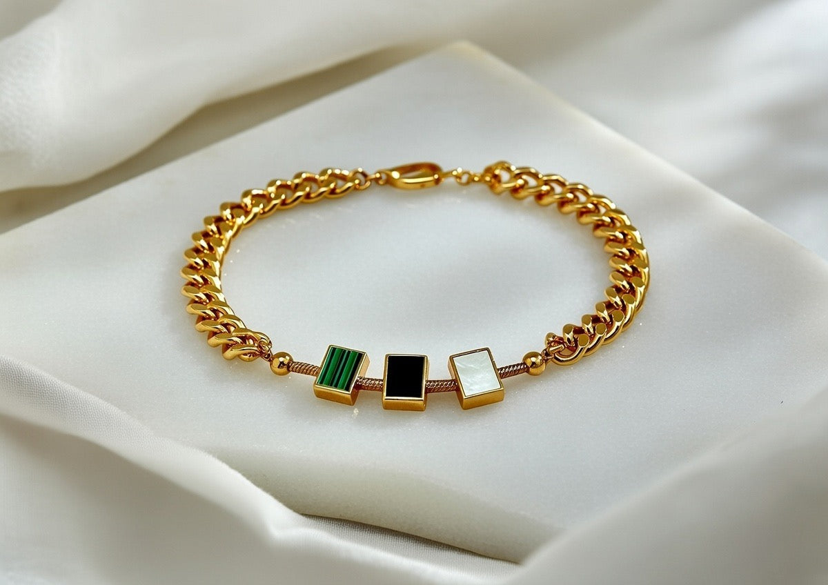 Gouden Schakelarmband met Driekleurige Details